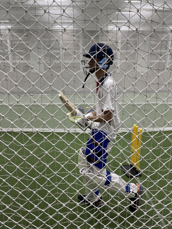 Cricket batting practice at indoor nets